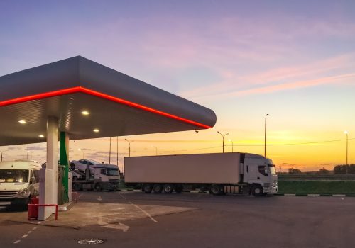 Truck at the parking lot of fueling station.